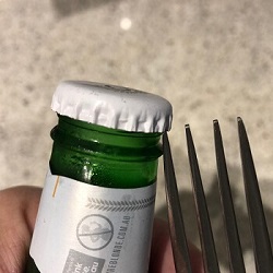 Remove a Bottle Cap Without an Opener 1