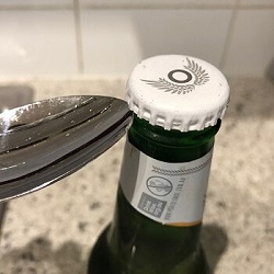Remove a Bottle Cap Without an Opener 2